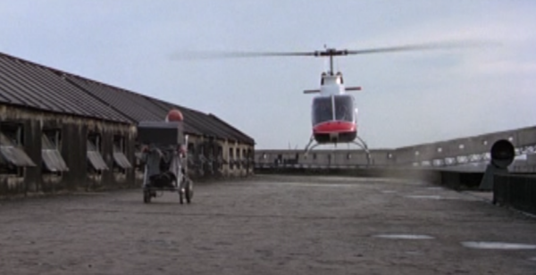 Bond chases a cripple using a helicopter
