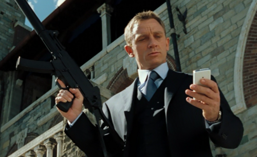 The End - Bond looking at Vesper's mobile over the fallen Mr. White