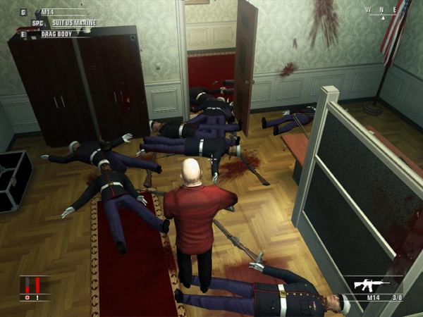 Agent 47 in front of a room of corpses he's caused.