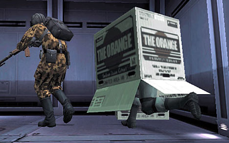 Solid Snake inside a cardboard box.