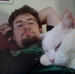 My ex-cat Snowy lying on me.
